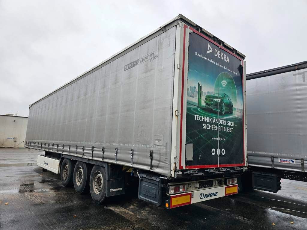 Fahrzeugabbildung Krone Gardine Standard Liftachse Krone Scheibe Zollsch