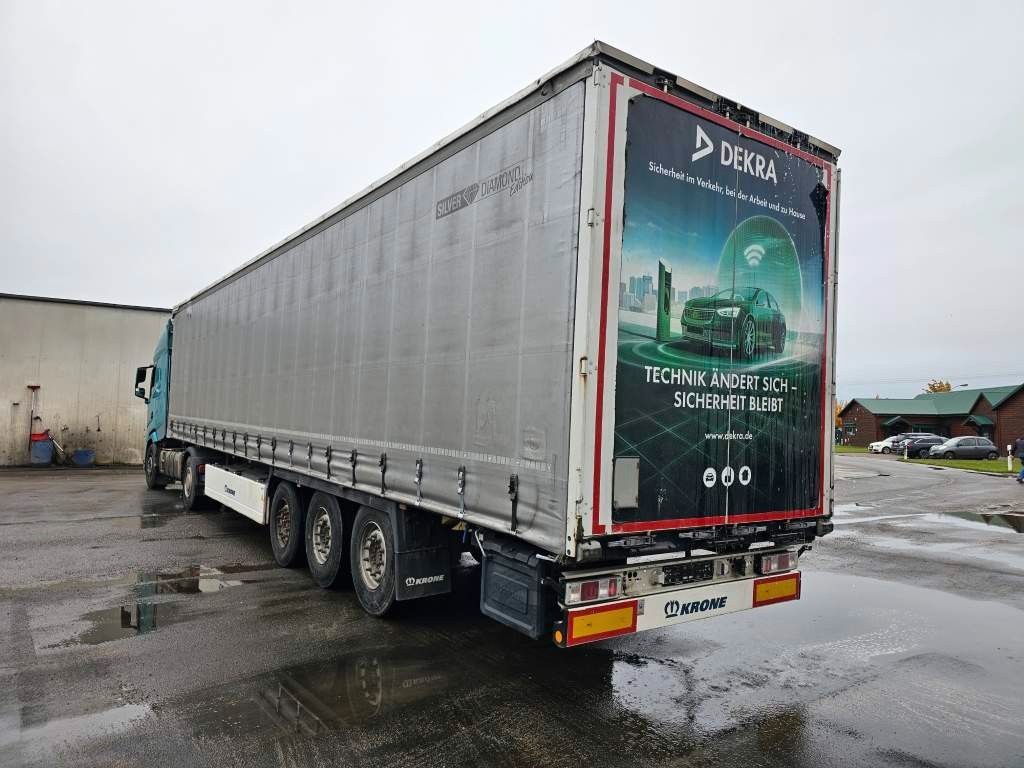 Fahrzeugabbildung Krone Gardine Standard Liftachse Krone Scheibe Zollsch