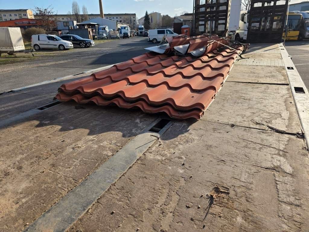 Fahrzeugabbildung MAN 26.400 TGX mit Baustoffplateau, geteilte Rampen