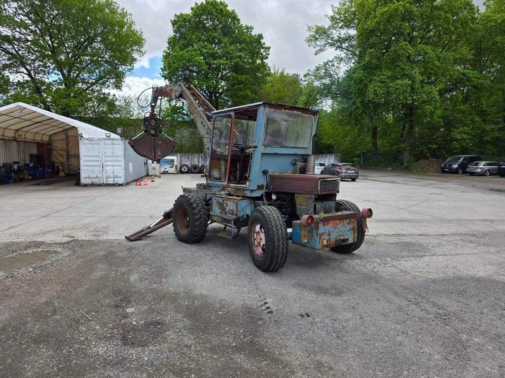 Fahrzeugabbildung Andere Craiova IH Radbagger ( Romania ) mit 2 Schalengr