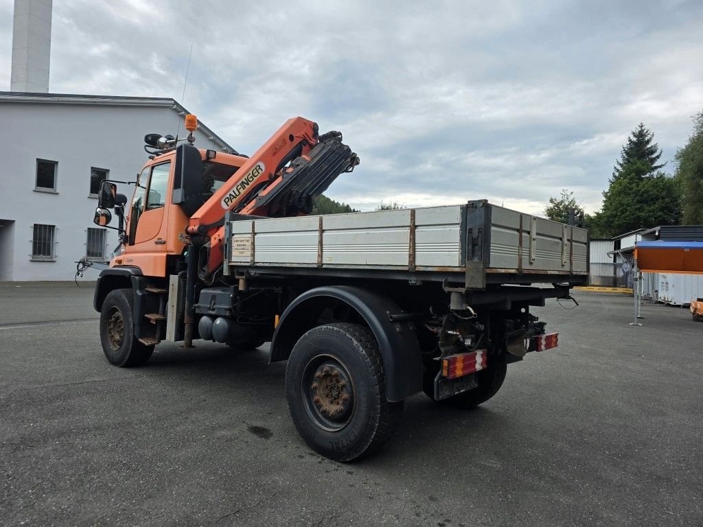 Fahrzeugabbildung Unimog U 500 3-Seiten-Kipper mit Kran PK 9501