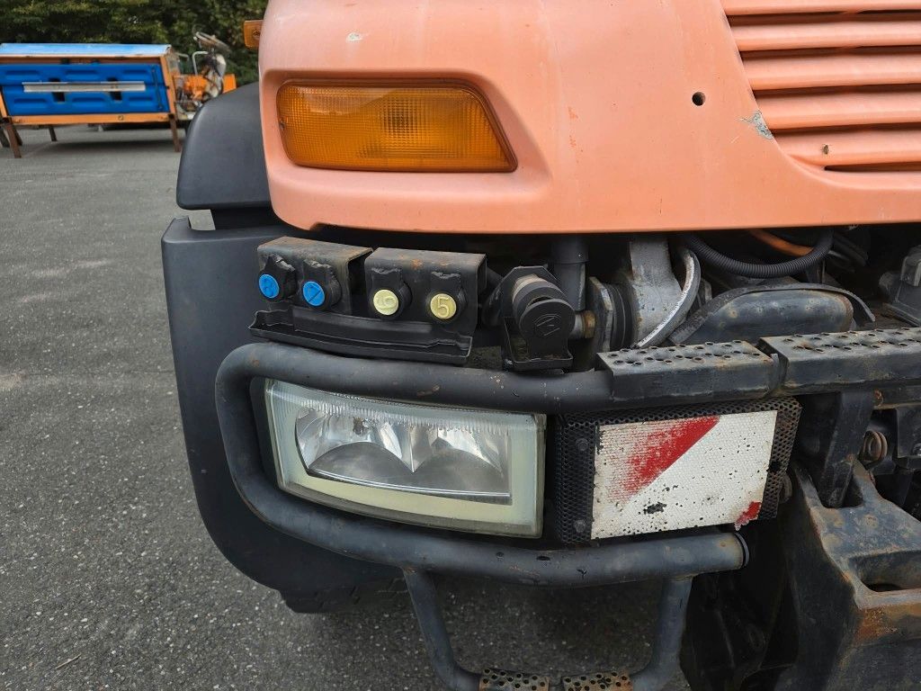 Fahrzeugabbildung Unimog U 500 3-Seiten-Kipper mit Kran PK 9501