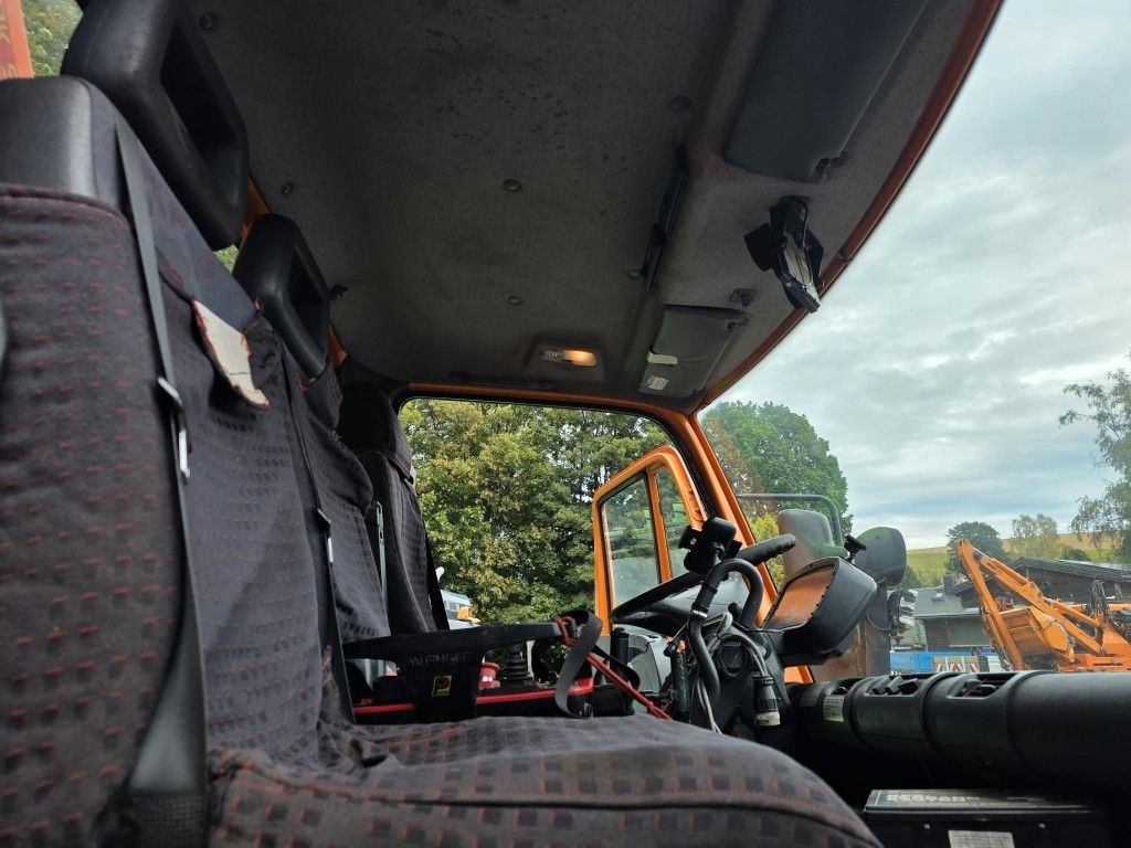 Fahrzeugabbildung Unimog U 500 3-Seiten-Kipper mit Kran PK 9501