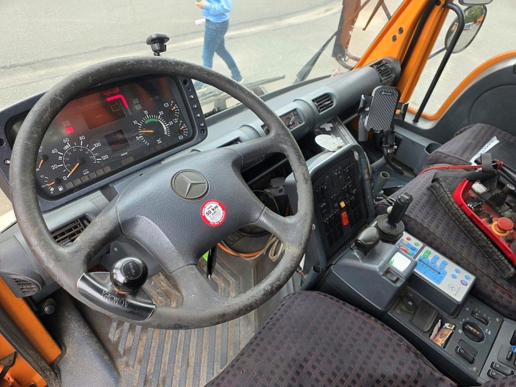 Fahrzeugabbildung Unimog U 500 3-Seiten-Kipper mit Kran PK 9501
