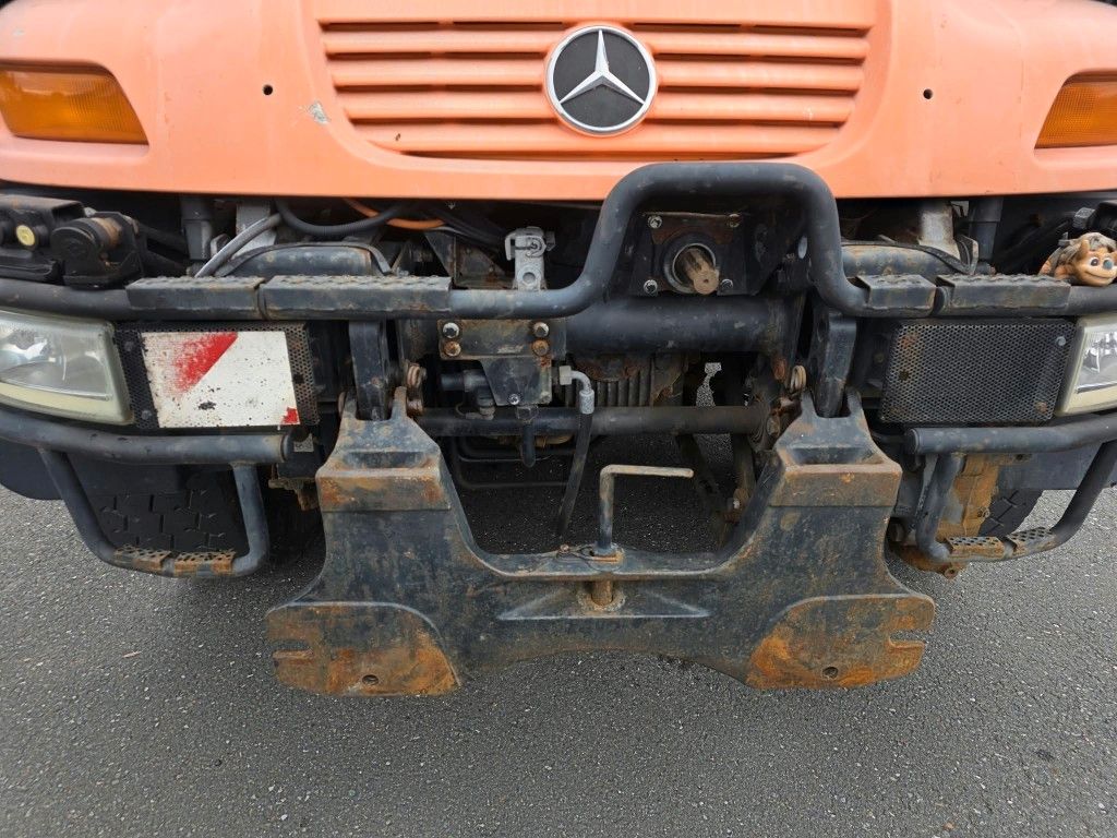Fahrzeugabbildung Unimog U 500 3-Seiten-Kipper mit Kran PK 9501