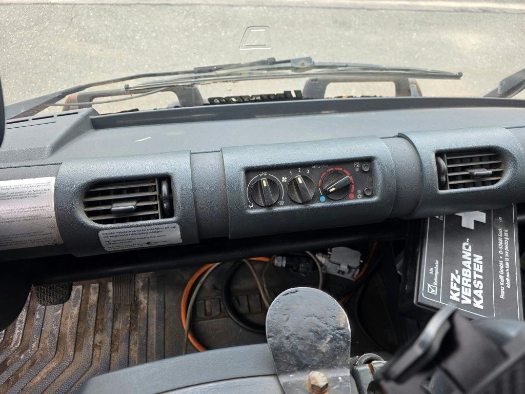 Fahrzeugabbildung Unimog U 500 3-Seiten-Kipper mit Kran PK 9501