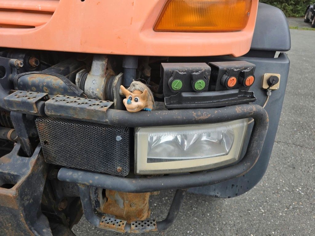 Fahrzeugabbildung Unimog U 500 3-Seiten-Kipper mit Kran PK 9501