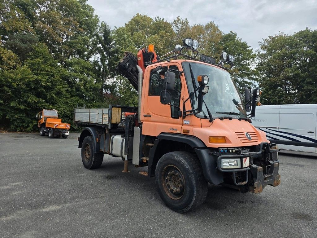 Fahrzeugabbildung Unimog U 500 3-Seiten-Kipper mit Kran PK 9501