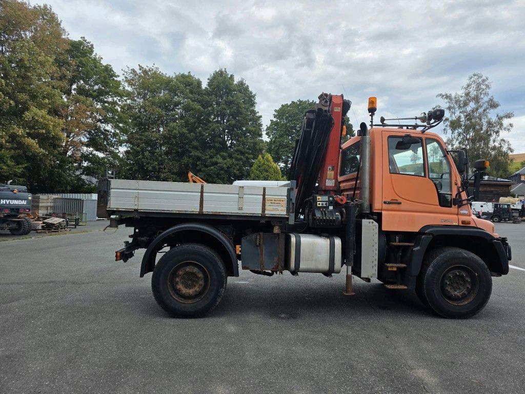 Fahrzeugabbildung Unimog U 500 3-Seiten-Kipper mit Kran PK 9501